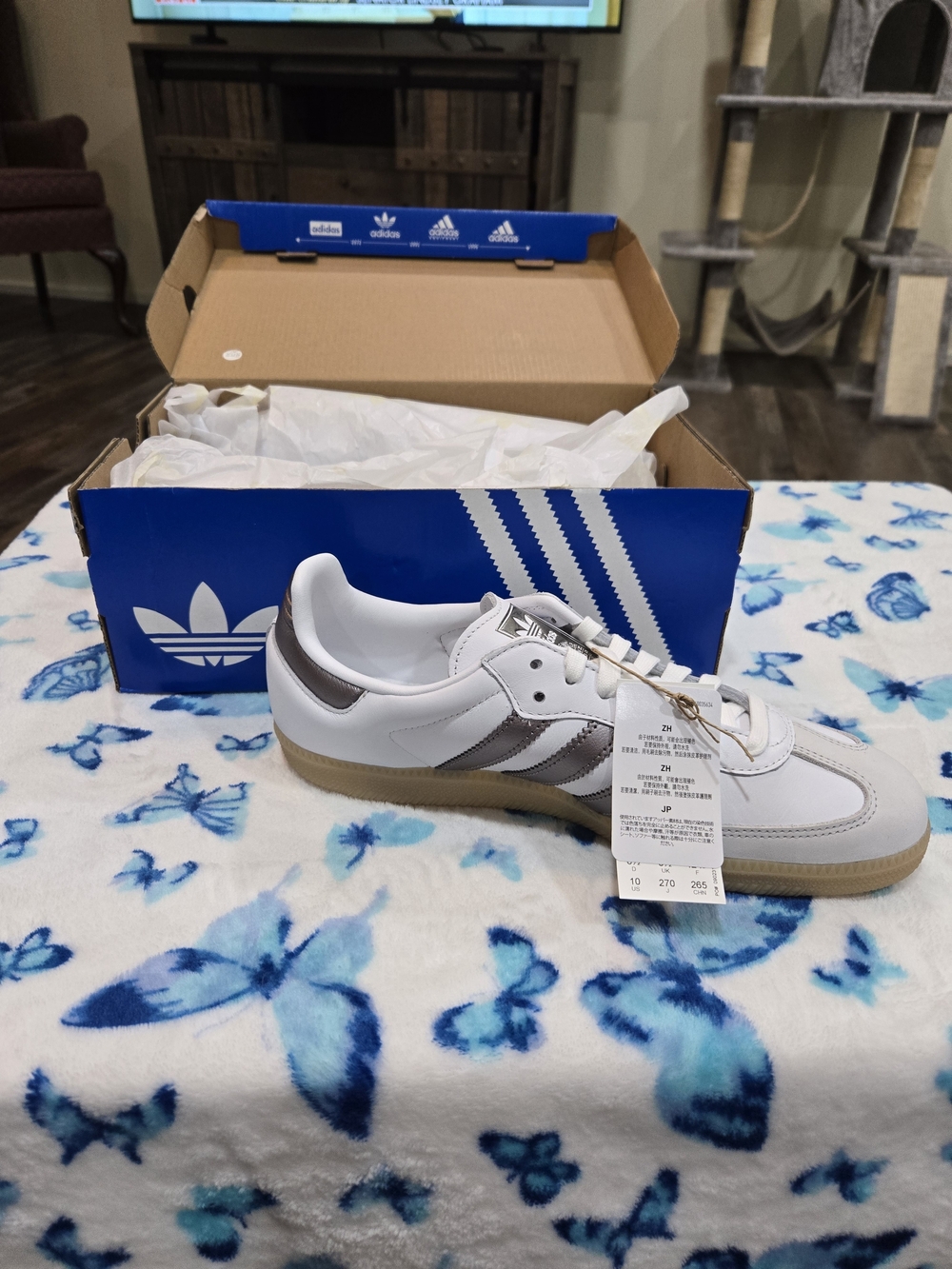 adidas Men’s White Sneakers with Metallic Silver Stripes and Gum Sole